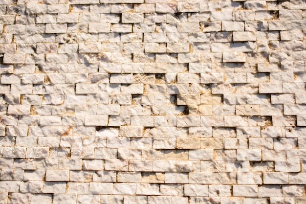 Fondo decorativo construido con pequeñas piedras.