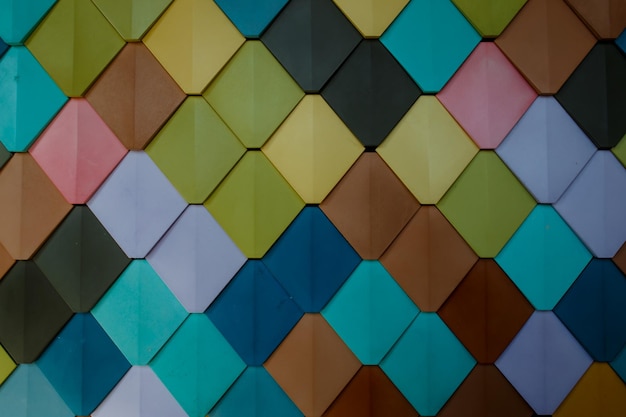 Foto fondo decorativo de triángulos de colorespiso de parquet de colores con motivos triangulares