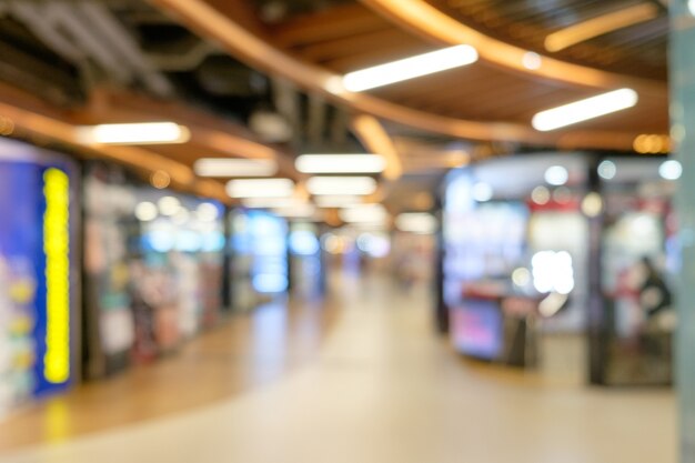 Fondo defocused borroso tienda abstracta de las compras con la luz del bokeh.