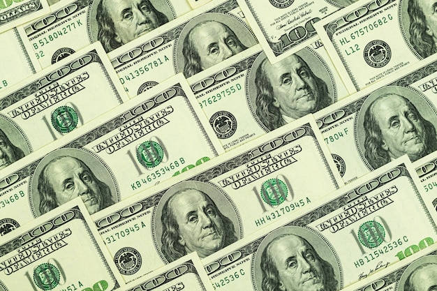 Fondo de dinero, billetes de dólar, una pila de imagen de billetes de cien dólares estadounidenses