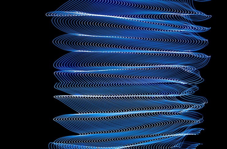 Foto fondo de diseño de línea de neón brillante, rodado con larga exposición, azul