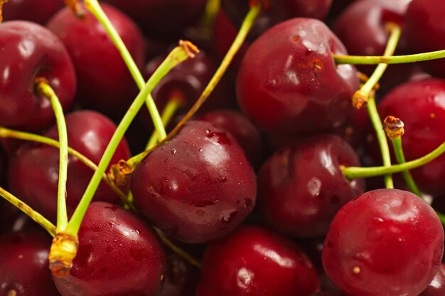 Fondo de dulce cereza roja mojada fresca, imagen macro