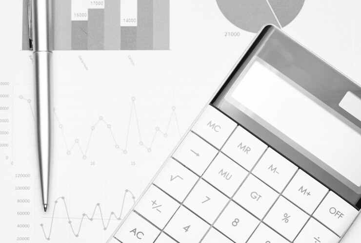 Fondo empresarial con gráficos, lápiz y calculadora