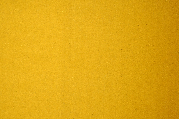 Fondo de espacio de copia en blanco manchado de textura áspera ligera de textura marrón de papel en amarillo