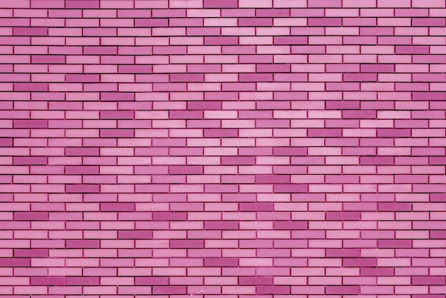 Fondo con estilo retro de construcción de pared de ladrillo rosa