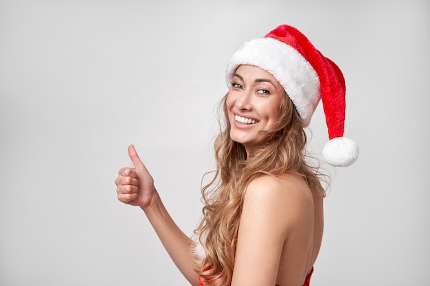 Fondo de estudio blanco mujer Navidad Santa Hat