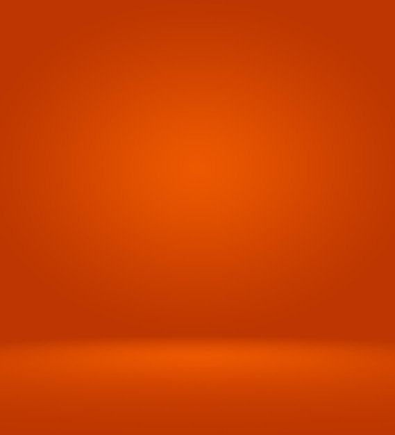 Fondo de estudio fotográfico naranja vertical con viñeta suave. Fondo degradado suave. Fondo de estudio de lienzo pintado.