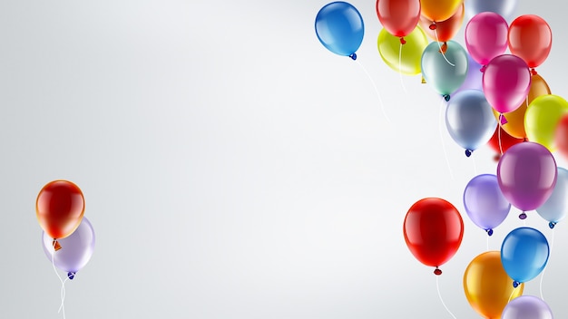 Fondo festivo claro con globos de colores brillantes