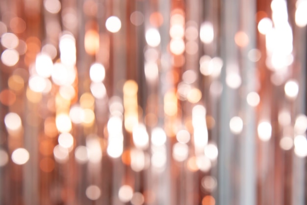 Foto un fondo festivo en un delicado color polvo hecho de una cortina con las luces en él