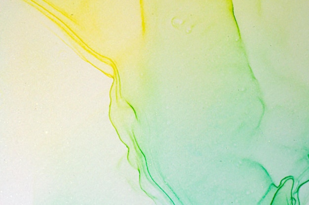 Fondo fluido de color brillante abstracto pintura de alcohol dibujada a mano con rayas doradas textura de técnica de tinta líquida para diseño de fondo de alta resolución