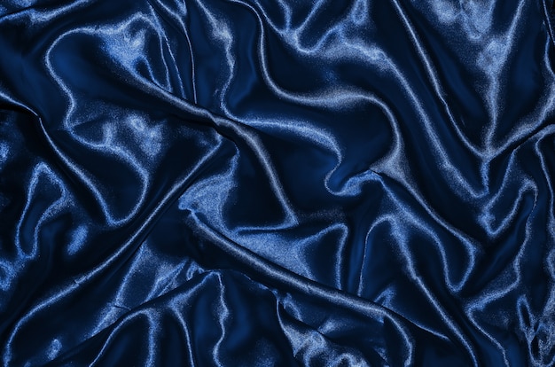 Fondo y fondo de pantalla de tela azul oscuro y textil de rayas