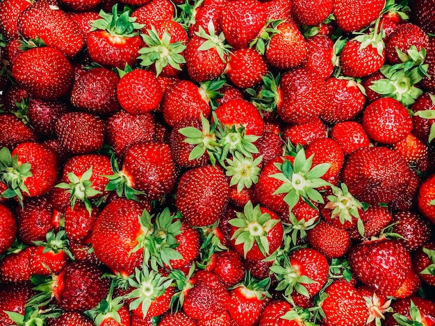 Fondo de fresas rojas frescas y jugosas