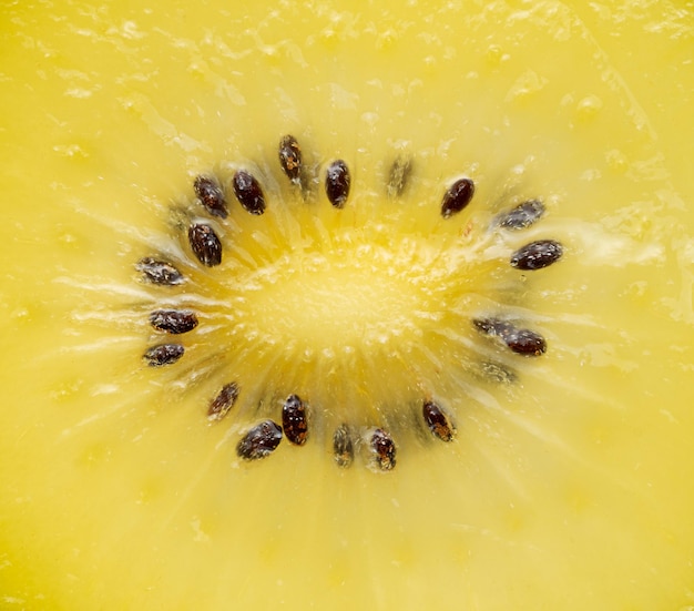 Fondo de frutas de macro de kiwi amarillo