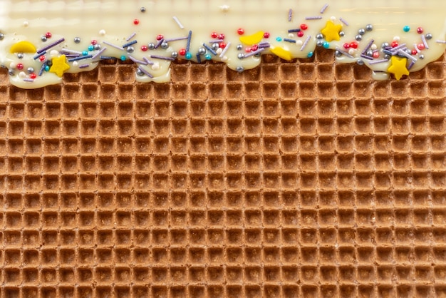 Fondo de galleta dulce con crema. Espacio para texto o diseño.