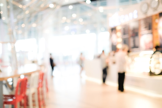 Fondo de gente borrosa: desenfoque de personas en el café con fondo claro bokeh