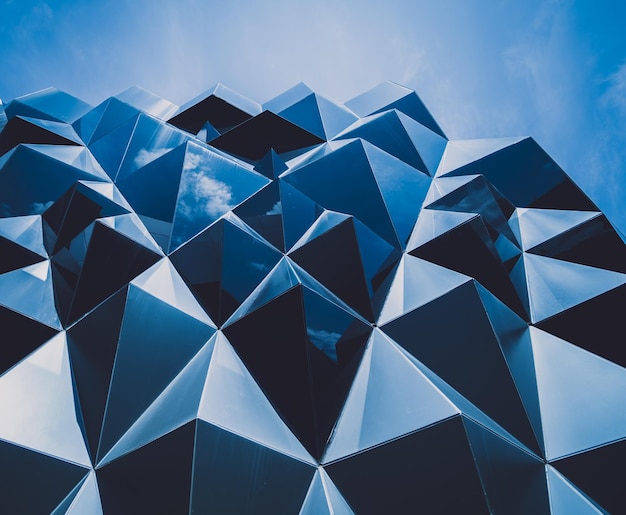 Fondo geométrico abstracto con triángulos y celdas de edificios
