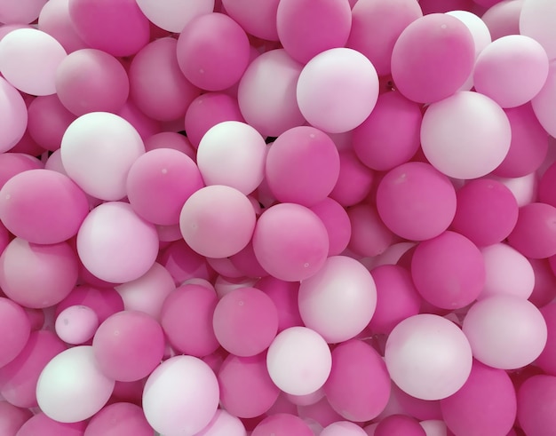 Fondo de globos blancos y rosas.