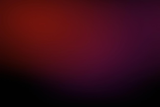 Un fondo gradiente con una textura suave que mezcla tonos rojos y púrpuras El fondo presenta un esquema de colores rojo y púrpura Fondo gradiente rojo oscuro con espacio de copia