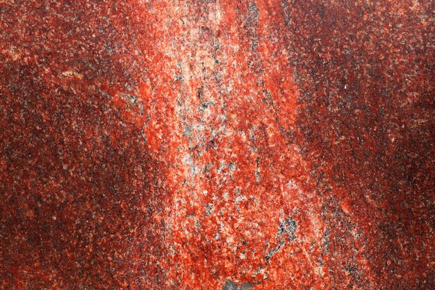 Fondo de granito rojo. Plantilla de diseño. una piedra natural