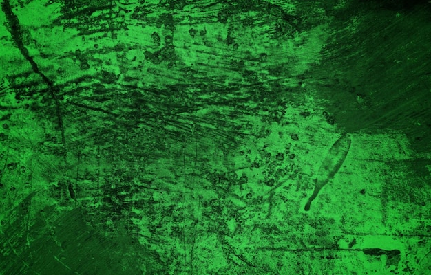 Fondo granulado degradado de color verde oscuro punto iluminado sobre efecto de textura de ruido negro tamaño de pancarta ancho
