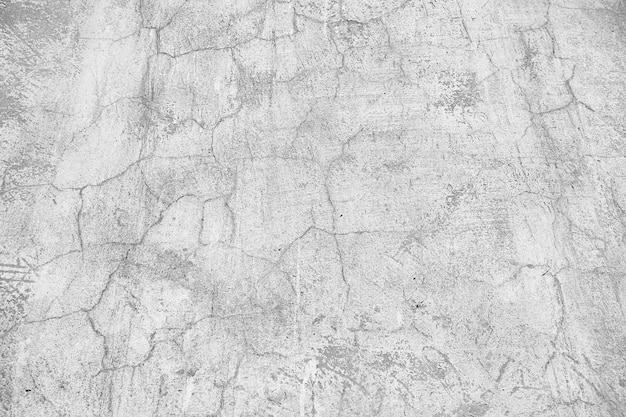 fondo de grietas de pared blanca / fondo vintage blanco abstracto, pared antigua de textura con grietas