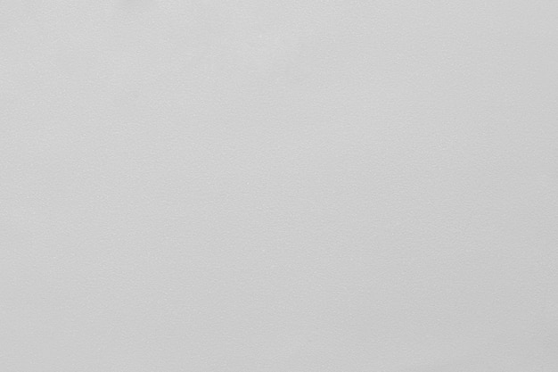 Fondo gris claro con pequeños destellos y textura. (Enfoque macro en la microtextura)