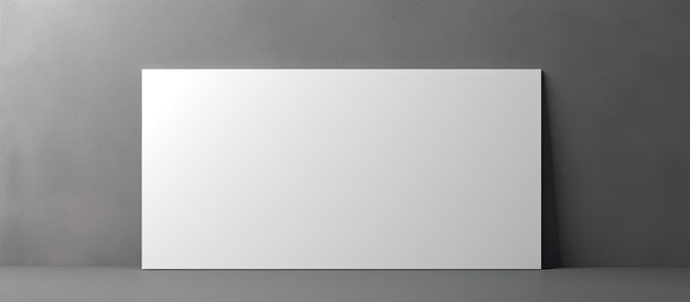 Foto un fondo gris con una tarjeta de visita blanca que tiene espacio para escribir representa los conceptos