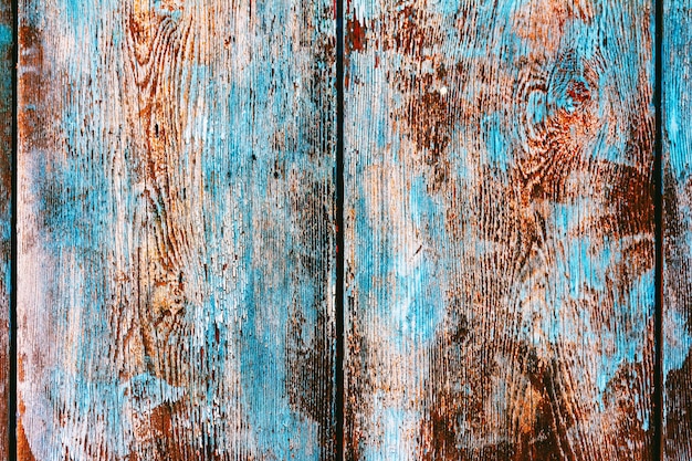 Fondo grunge retro de tablones de madera con restos de pintura vieja