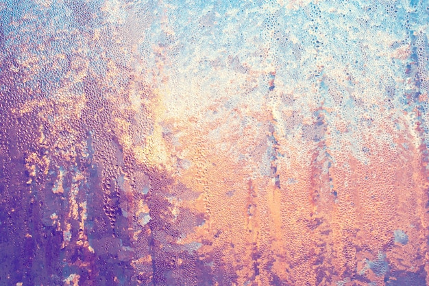 Fondo de hielo escarchado sobre vidrio de ventana