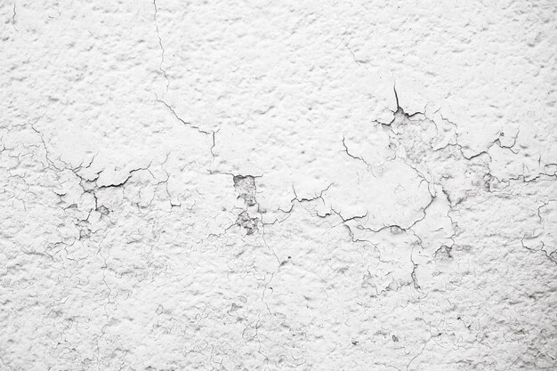 Fondo de hormigón de pared áspera irregular blanco