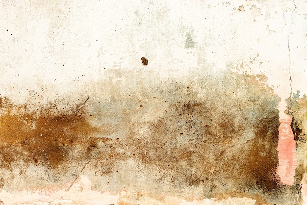 Foto fondo de hormigón de textura de pared. fragmento de pared con arañazos y grietas.