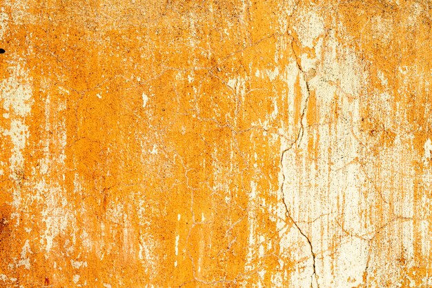 Fondo de hormigón de textura de pared. Fragmento de pared con arañazos y grietas.