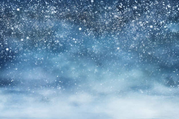 El fondo de invierno del tema de la nieve dramática mágica