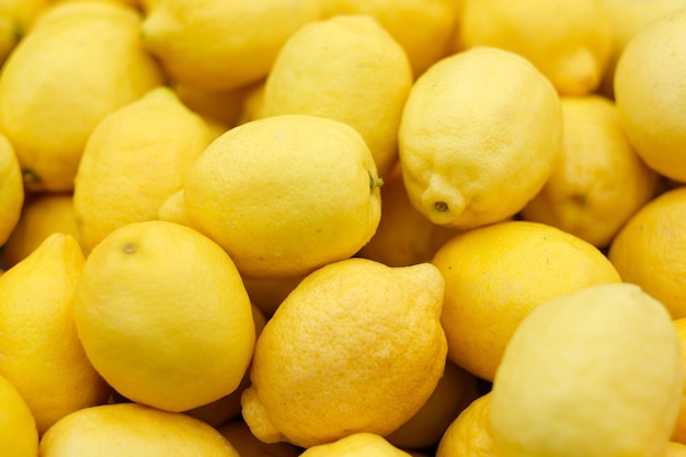 Fondo de limones amarillos maduros