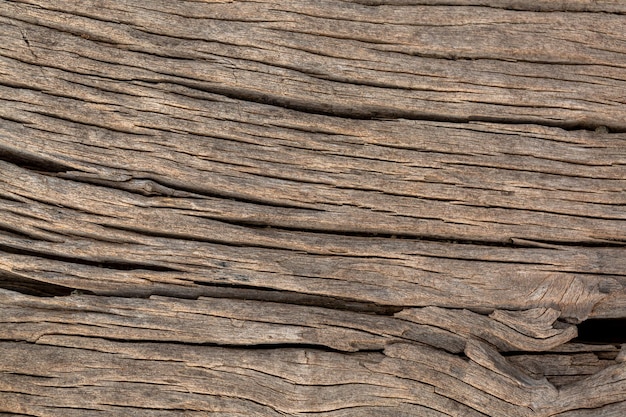 fondo de madera macro, suelo de madera antiguo con grietas naturales, textura de madera marrón