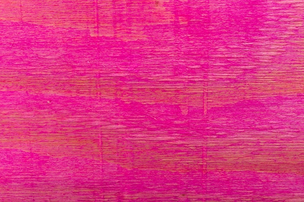 Fondo de madera rosa utilizado para muros de construcción