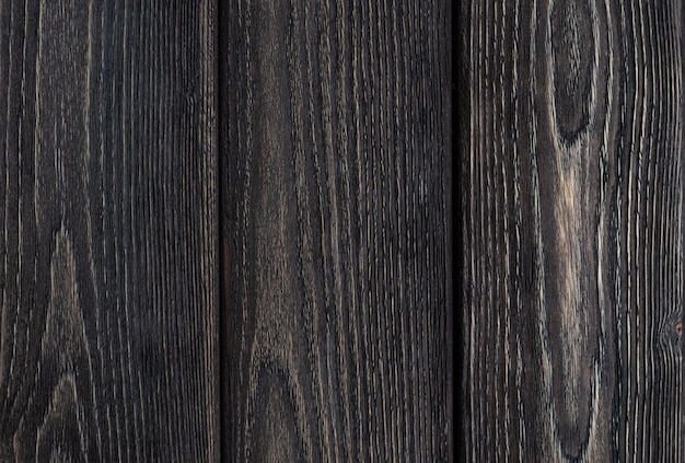 Fondo de madera rústica. Tablas de color gris. Espacio para texto.