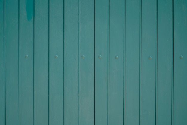 Fondo de madera verde con viejas tablas de tablones pintados