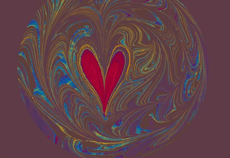 Foto fondo de marmoleado de ebru con forma de corazón marmoleado de arte único