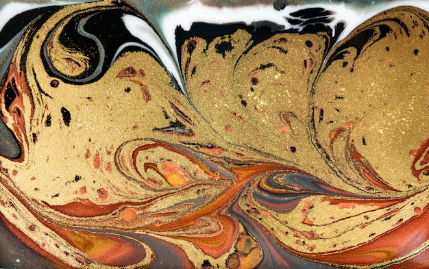 Foto fondo de marmoleado marrón y oro. textura líquida de mármol dorado.