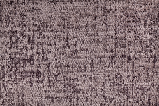 Fondo marrón esponjoso de tela suave y lanuda. Textura de primer plano textil