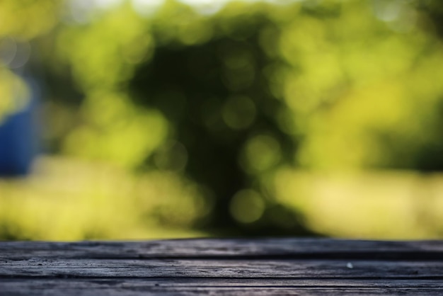 Fondo de mesa de madera al aire libre bokeh