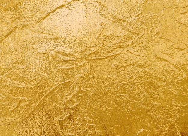 Foto fondo metálico brillante de la superficie de la textura del oro