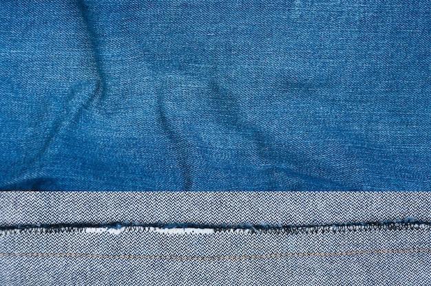 Fondo de mezclilla azul Textura de jeans de mezclilla azul Fondo de jeans