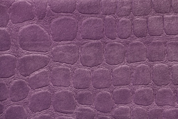 Fondo morado de un material textil de tapicería suave