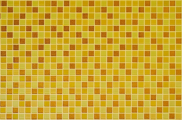 Fondo de mosaicos de oro amarillo para decoración y diseño de paredes de baños y cocinas