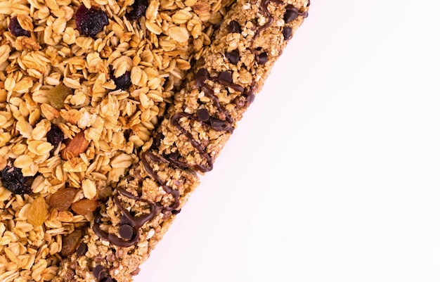 Fondo de muesli Desayuno con pasas, frutos secos y nueces de avena. copie el espacio