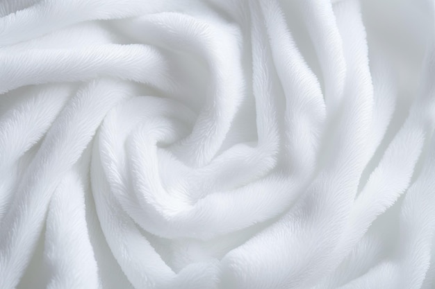 El fondo muestra la textura de una toalla blanca. Este tejido o textil está hecho de fibras de algodón.