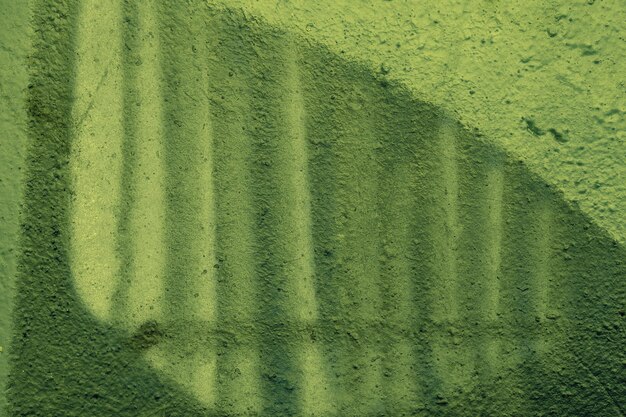 Fondo de muro de hormigón de grunge verde abstracto