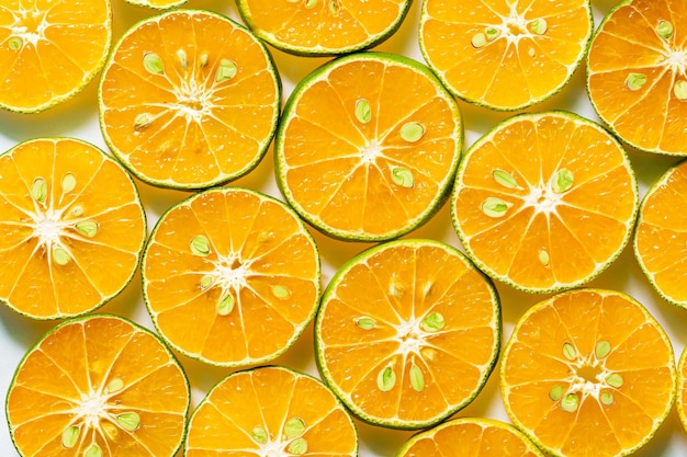 fondo naranja macro, Montón de fondo de rodajas de naranja fresca. Nutrición saludable con vitamina c.